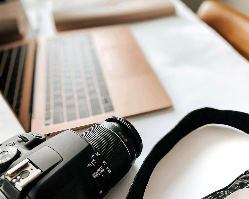 Person reading cybersecurity blog on a laptop in a modern workspace